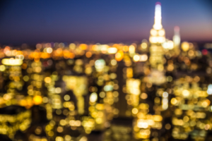 Defocused blur of New York City buildings lights at night
